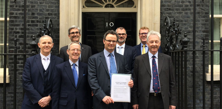 FIS David Frise hands petition to Downing Street