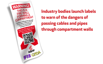 Industry bodies launch labels to warn of the dangers of passing cables and pipes through compartment walls